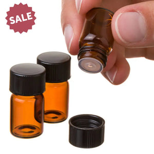 5/8 Dram Amber Glass Vials Orifice Reducers And Black Caps, hand reference shot