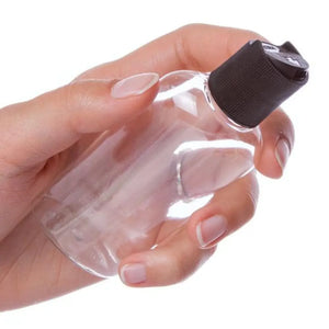 2 Oz. Clear Oval Plastic Bottle With Black Disc-Top Cap
