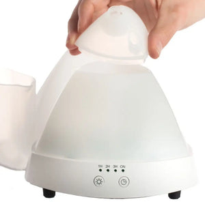 Airmid Ultrasonic Diffuser, hand reference shot