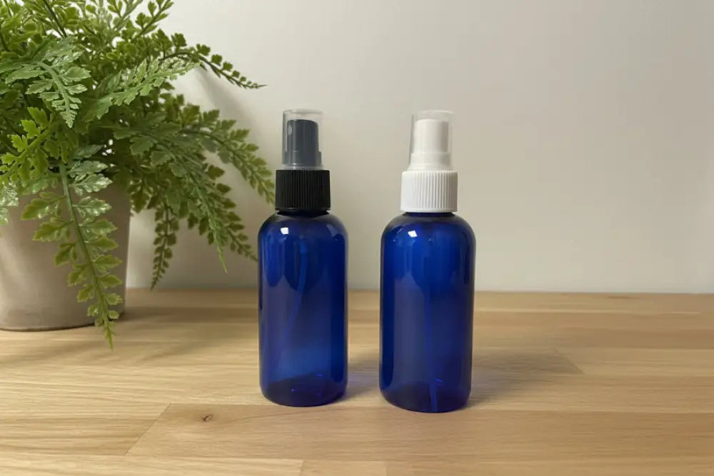 4 oz. Blue PET Boston Round Plastic Bottle (24-400 Neck Size) with Misting Sprayer