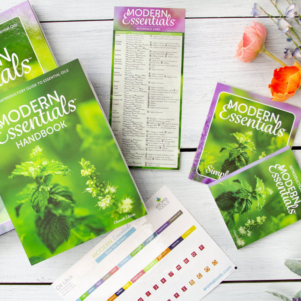 The Modern Essentials Family (11th Editions) and some flowers.