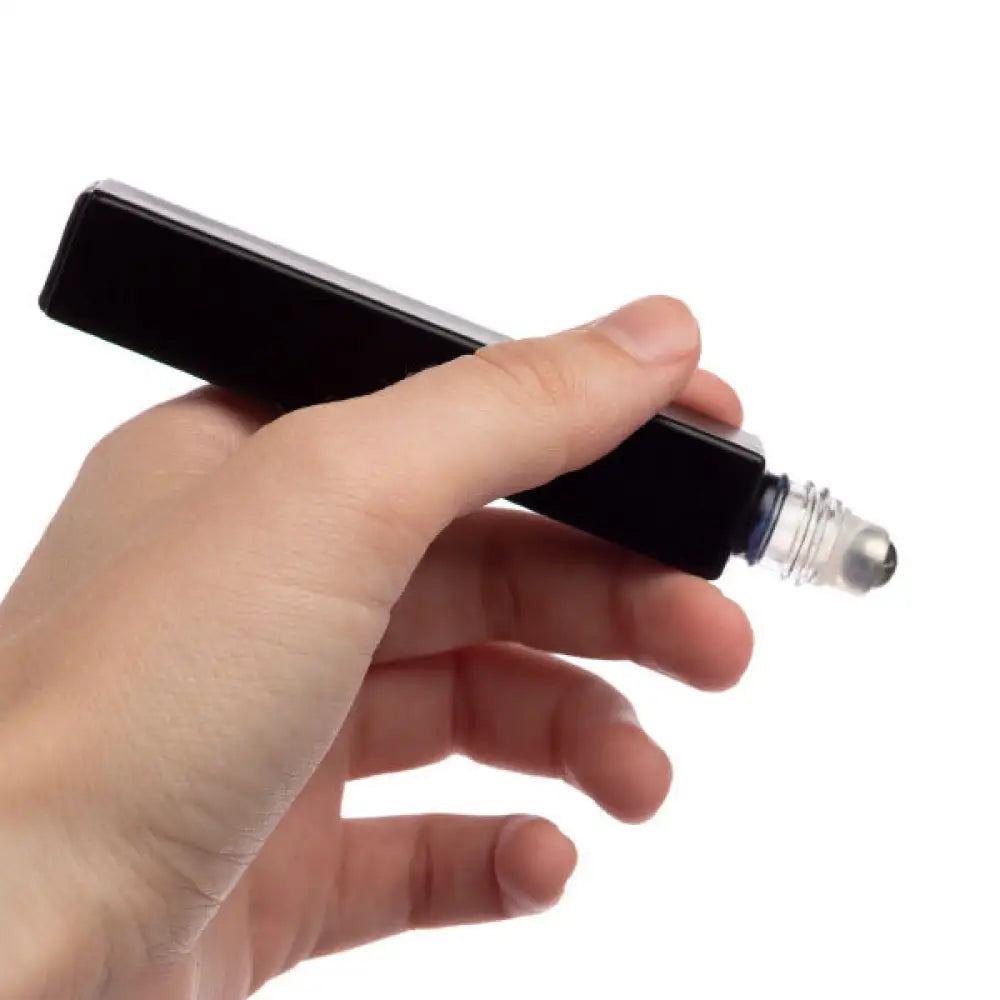 1/3 Oz. Matte Black Square Glass Bottles With Metal Roll-Ons And Gold Caps (Pack Of 6), hand reference shot