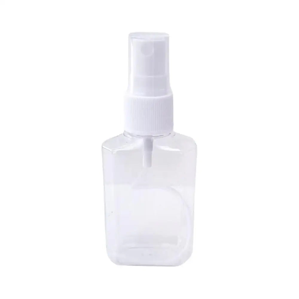 2 Oz. Clear Plastic Bottle With White Misting Sprayer