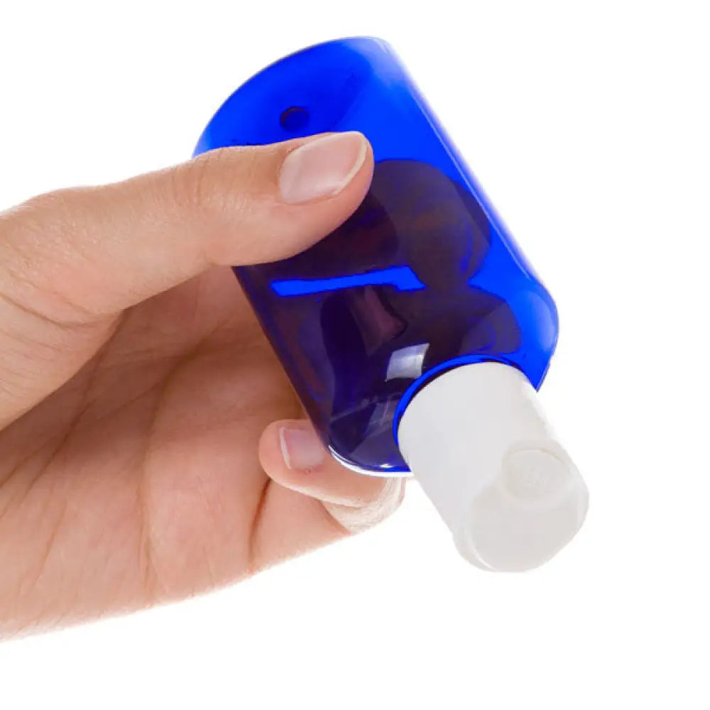 2 Oz. Blue Plastic Oval Bottle With White Disc-Top Cap