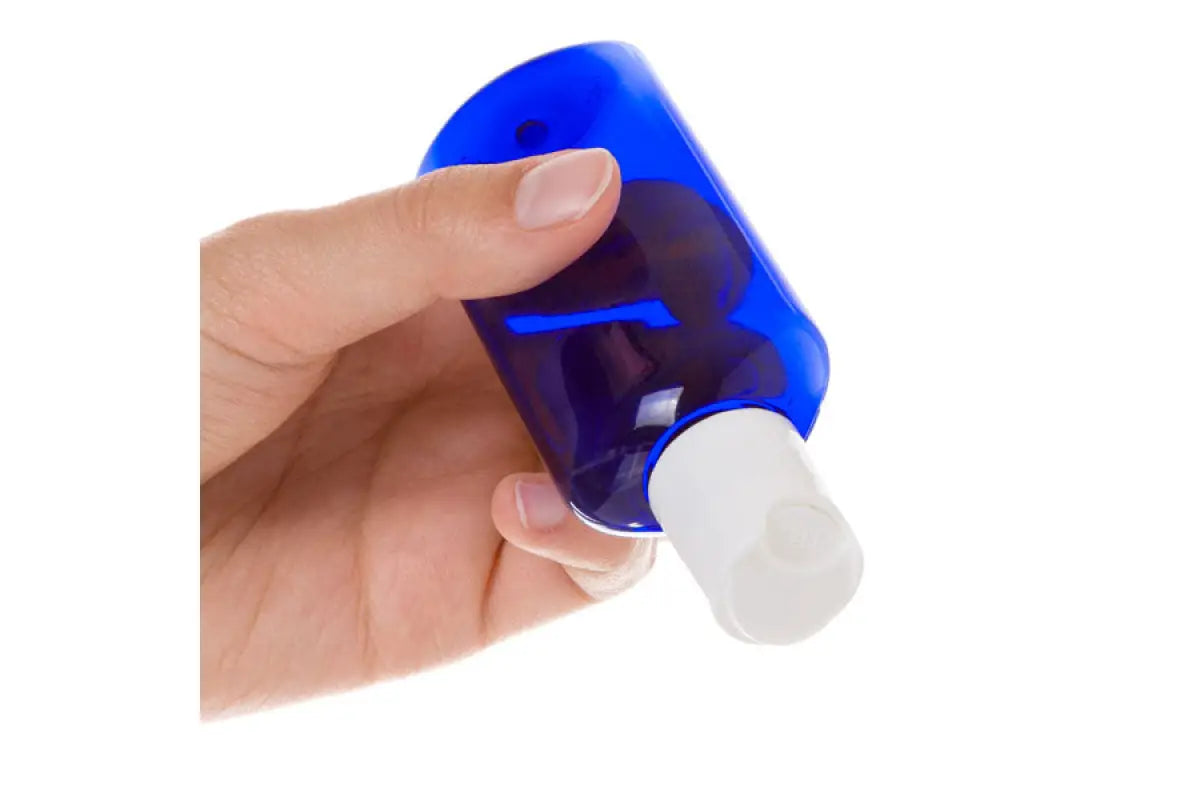 2 oz. Blue Plastic Oval Bottle with White Disc-top Cap