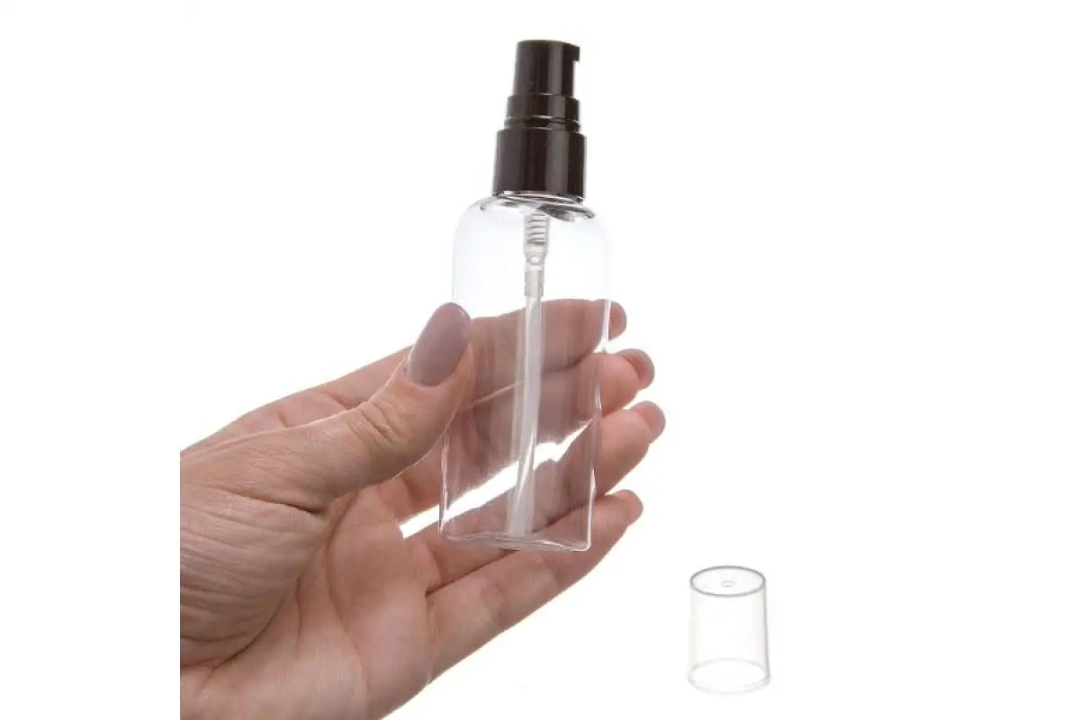 2 oz. Clear Plastic Oval Bottle with Black Treatment Pump
