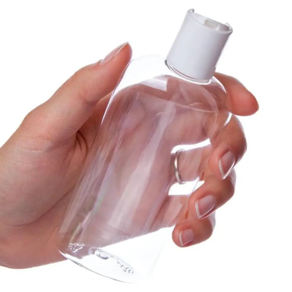 4 oz. Clear Oval Plastic Bottle with White Disc-Top Cap