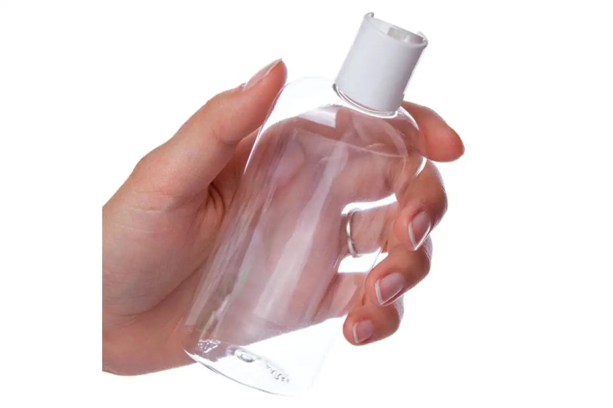 4 oz. Clear Oval Plastic Bottle with White Disc-Top Cap