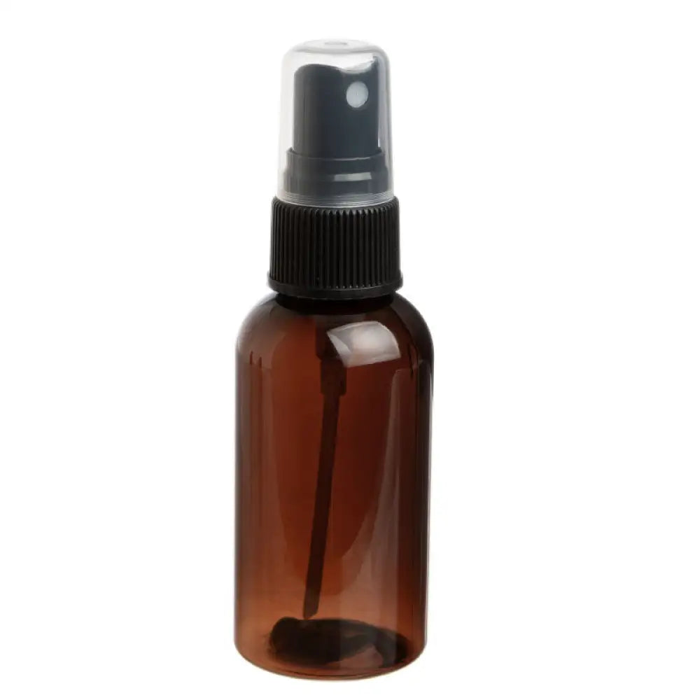 2 oz. Amber PET Plastic Boston Round Bottle with Black Misting Sprayer